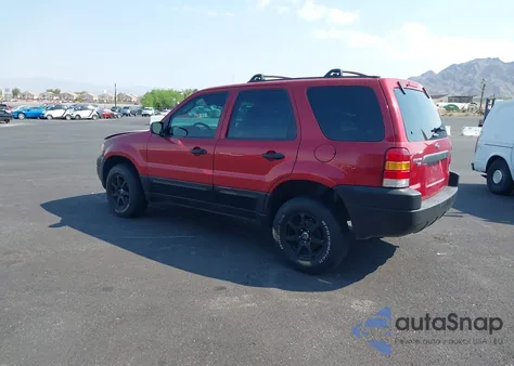 2003 Ford Escape Xls z USA, uszkodzony, nr VIN 1FMYU02193KB33177